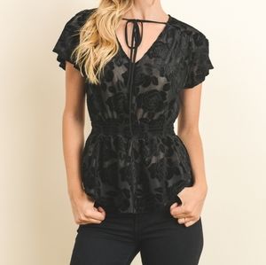 Velvet floral print on sheer V-neck top. BLACK